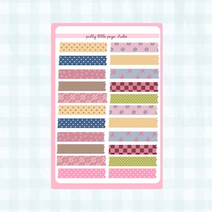 May include: A sheet of decorative washi tape strips in various patterns and colors, including polka dots, stars, and floral designs. The tape is arranged on a pink rectangular background with the text "pretty little pages studio".