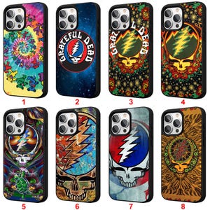 May include: A collection of eight phone cases featuring various designs. The cases showcase vibrant graphics, including tie-dye patterns, skulls, and the words "Grateful Dead." Each case has a black border and is designed for a smartphone.