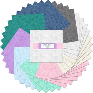 May include: A pack of 42 5-inch pre-cut fabric squares featuring a floral pattern in shades of blue, green, purple, pink, white, and cream. The fabric squares are arranged in a circle with a label that reads "Flora Dots" in the center.