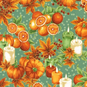 May include: A teal background with a repeating pattern of pumpkins, oranges, leaves, and candles. The pumpkins are orange and have a stem. The oranges are a deep orange and some are sliced in half. The leaves are green and gold. The candles are white, green, and orange.