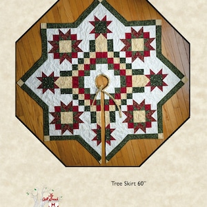 May include: A quilted tree skirt with an Irish Snowflake design. The star-shaped skirt features a white background with red, green, and tan geometric patterns. The text "Irish Snowflake" and "Tree Skirt 60" are visible.