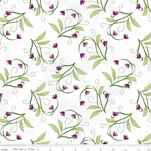 May include: A white fabric featuring a repeating pattern of purple bell-shaped flowers with green stems and leaves, accompanied by a 12-inch ruler at the bottom edge with the text Riley Blake Designs printed near the left side.