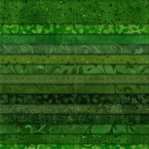 May include: A stack of green fabric squares with various patterns and textures. The fabric is labeled "Emerald Forest" and "40 Karat Gems". The fabrics range in shades of green, from light to dark, with floral and speckled designs.