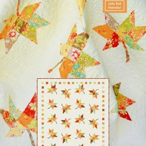 May include: A quilted textile featuring a leaf design in autumn colors. The quilt has a white background with large, colorful leaf appliqués. The text "Twirl" and "Jelly Roll Friendly!" are visible.