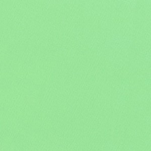 May include: A solid, light green background.