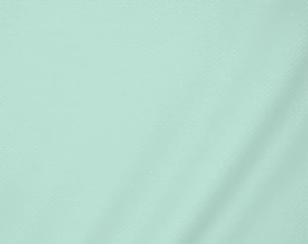 May include: A solid light mint green fabric with a subtle, uniform textured pattern across the entire surface. The material displays soft, gentle folds and shadows that highlight the consistent weave and the pale, cool-toned color of the textile.