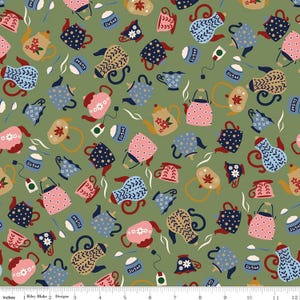 May include: A fabric pattern featuring a repeating design of teapots, teacups, and sugar bowls in various colors like pink, blue, and tan, set against a green background. The teapots have floral and patterned details. The design includes tea bags and spoons.