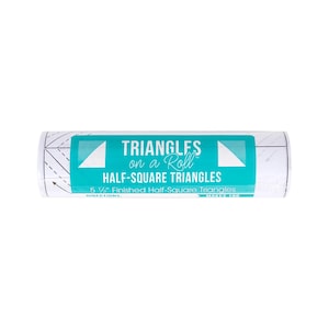 May include: A roll of white paper with a teal label featuring the text "TRIANGLES on a Roll HALF-SQUARE TRIANGLES". The label also indicates the triangles are 5 1/2" finished. The roll is for making half-square triangles.