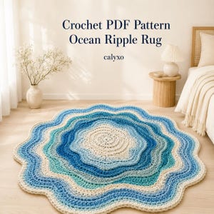May include: A round crochet rug featuring concentric wavy ripples in shades of cream, light blue, and dark blue. The text "Crochet PDF Pattern Ocean Ripple Rug" and "calyxo" is displayed above the rug in a dark blue serif font.