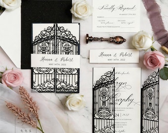 May include: Elegant wedding invitation suite featuring a black gate design. Includes invitation cards, RSVP cards, and a wax seal. The invitation reads "Hanna & Robert, May 14th, 2022". Soft pink and white roses add a romantic touch.