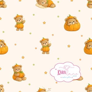 May include: A seamless pattern featuring brown teddy bears wearing orange pumpkin costumes, interspersed with small orange stars and green dots on a cream background. A pink cloud-shaped logo with the text Kara Lane Corner is visible.