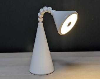 Ikea Fryebo articulating + rechargeable desk lamp designed by Ola Wihlborg
