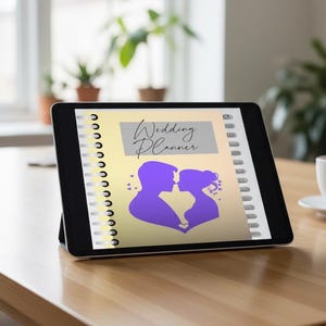 May include: A black tablet displaying a wedding planner. The planner's cover features a purple silhouette of a couple kissing, with the words "Wedding Planner" in elegant script. The planner is open, revealing lined pages.