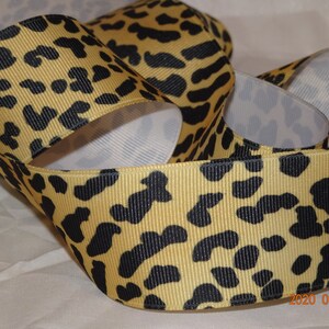 LUIPAARDprint grosgrain lint 7/8" zwart op goud Oude winkelvoorraad