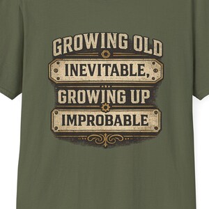 Growing Up Improbable Unisex Softstyle T-Shirt