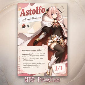 May include: A rectangular trading card featuring an anime-style character named Astolfo, labelled as Swiftblade Vindicator. The card displays text for Creature, Human Soldier, Double strike, Vigilance, and Trample, with a 1/1 power and toughness.