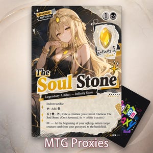 Op de afbeelding: Een rechthoekige ruilkaart getiteld The Soul Stone, met een illustratie van een blond personage in zwart-gouden kleding. De kaart toont de tekst Legendary Artifact, Infinity Stone en spelregels, met een geel edelsteenpictogram in de hoek.