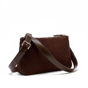 May include: A rustic wooden sign with the text "Welcome to our home" in a handwritten style. The sign features a distressed finish and a simple, inviting design, perfect for a front porch or entryway.