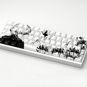 May include: A set of three ceramic mugs with a speckled, matte finish. The mugs are in shades of cream, light gray, and dark gray. Each mug has a simple, minimalist design and a rounded handle. Perfect for coffee or tea.