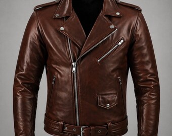 May include: A brown leather motorcycle jacket with a classic asymmetrical zip closure. The jacket features a notched collar, multiple zippered pockets, and a belt at the waist. The leather has a glossy finish and visible stitching details.