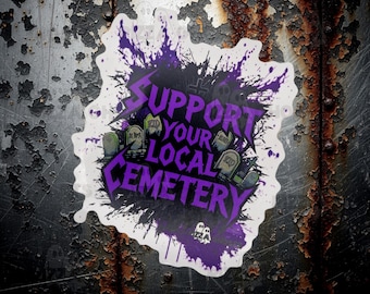May include: A sticker with the text "SUPPORT YOUR LOCAL CEMETERY" in purple, with a splash of purple paint and tombstones. The sticker has a white border and a ghost graphic. The background is a distressed metal surface.