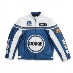 May include: A blue and white leather motorcycle jacket featuring the Dodge logo in a large circle on the front, Mopar and SRT branding, and the words Mopar and Ram printed vertically along the sleeves, with a Pennzoil patch on the left shoulder.
