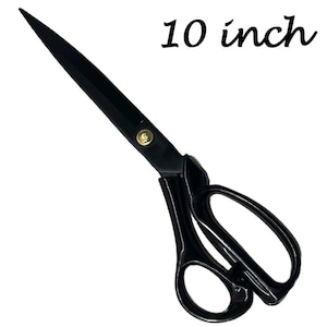May include: Black scissors with a 10-inch blade. The scissors have a gold-colored rivet and large finger holes. The text "10 inch" is written in black cursive font.