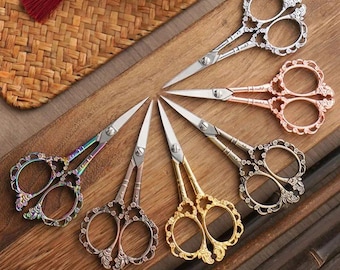 Tijeras de sastre retro de acero inoxidable para coser telas y manualidades domésticas.