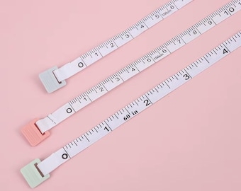 Cinta métrica retráctil flexible – 1,5 m. Herramienta para costura, sastrería y manualidades.