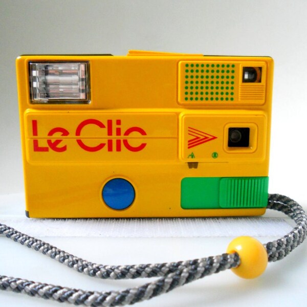 SALE: Le Clic - Vintage Yellow Disk Camera