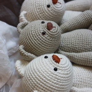 three classic vintage style crochet amigurumi teddy bears