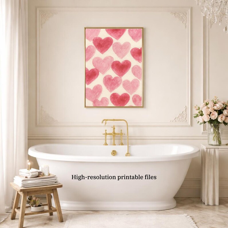 May include: A framed print featuring a pattern of pink and red hearts on a cream background. The print is displayed above a white bathtub in a bathroom setting. The text "High-resolution printable files" is visible.