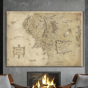 May include: A framed map of Middle Earth, featuring intricate details of the fictional world. The map is in sepia tones, with text including "Middle Earth" and "the sundering seas". The map is displayed above a fireplace, with two chairs in front.