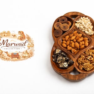 May include: A wooden serving tray filled with various nuts and dried fruit. The tray is divided into multiple sections, each holding different items like almonds, walnuts, cashews, figs, and chocolates. The tray is next to a logo that says "Marwad Collection".