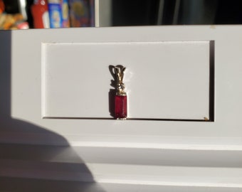 8mm Ruby with a 2mm White Sapphire Accent Silver Pendant