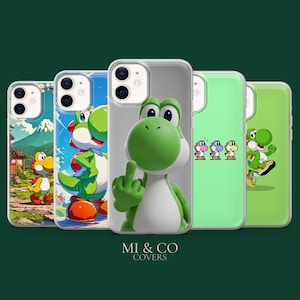 May include: A collection of phone cases featuring Yoshi from the Super Mario franchise. The cases display various colorful Yoshi designs, including a green Yoshi giving the middle finger. The cases are in a row, with the brand name "MI & CO COVERS" at the bottom.