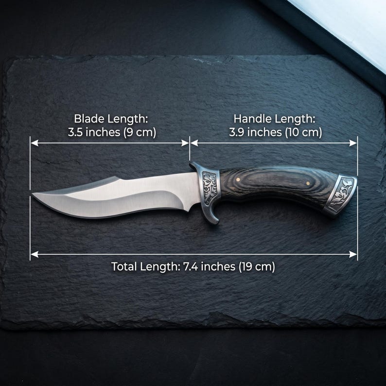 May include: A stainless steel knife with a dark wooden handle and decorative metal accents. The blade is 3.5 inches (9 cm) long, the handle is 3.9 inches (10 cm), and the total length is 7.4 inches (19 cm).