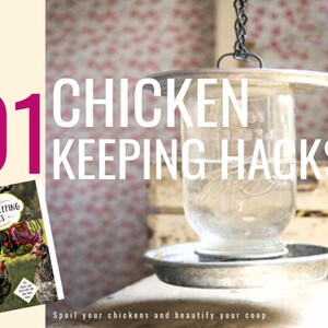 May include: A book titled "101 Chicken Keeping Hacks" by Lisa Steele. The book cover features a black and white chicken with a red and white basket. The book cover is in front of a hanging water dispenser for chickens. The dispenser is made of a clear glass jar with a metal lid and a metal base. The background is a pink and white floral pattern.