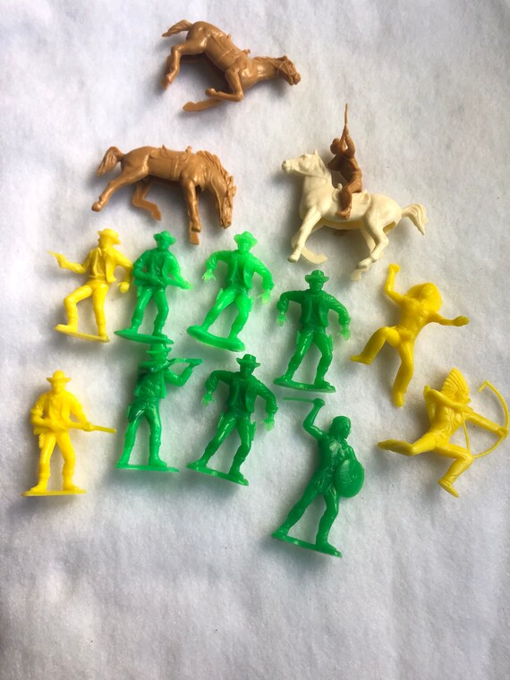 vintage plastic cowboys and indian figures