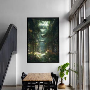 May include: A framed art print showing a verdant, overgrown passage with a path disappearing into the distance. The artwork features vivid greens, yellows, and pinks, suggesting a fusion of nature and architecture. The print is displayed on a white wall above a wooden table and black chairs.