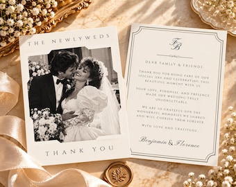 May include: A white wedding thank you card featuring a black and white photograph of a couple in formal attire. The text reads THE NEWLYWEDS THANK YOU and includes a message of gratitude signed by Benjamin and Florence with a monogram.