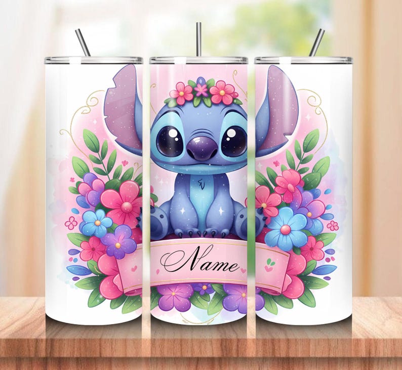 May include: A stainless steel tumbler featuring a cartoon character with large eyes, wearing a floral crown, and surrounded by flowers. The design includes a pink banner with the word "Name". The tumbler has a straw and a lid.
