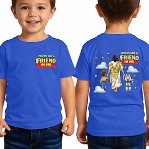 A young boy wearing a blue t-shirt with a graphic design on the back.