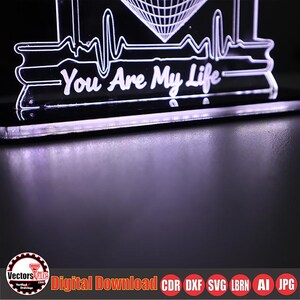 May include: A clear acrylic night light with the words "You Are My Life" in white script. The design includes a heartbeat line and a geometric shape. The bottom of the light is black. The image also includes the text "Digital Download" and file type abbreviations.