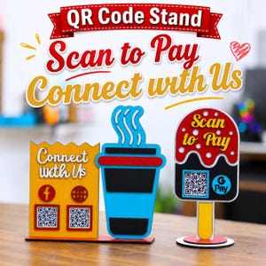 May include: A set of two colorful QR code stands. One stand is yellow with a coffee cup shape and two QR codes labeled Connect with Us. The second stand is shaped like a popsicle with a red and white top, a black base, and a QR code labeled Scan to Pay.