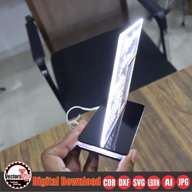 May include: A black acrylic LED light-up display stand with a rectangular shape. The stand has a white light border and a white light-up panel. The text "Digital Download" is visible. The stand is held by a person.