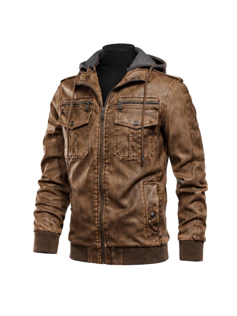 May include: Brown faux leather jacket with a grey hooded lining. The jacket features multiple pockets, a zip closure, and ribbed cuffs and hem. The jacket is displayed on a black mannequin.