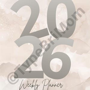 May include: A weekly planner for the year 2026, featuring large gray numerals against a watercolor-style background in shades of beige and brown. The words "Weekly Planner" are written in a cursive font.