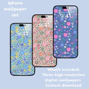 May include: Three smartphones displaying floral pattern wallpapers in blue, pink, and peach. The text "iphone wallpaper set" is at the top, with "What's included: Three high-resolution digital wallpapers Instant download" at the bottom.