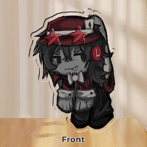 May include: A cartoon illustration of a character with a red hat adorned with star-shaped accents. The character has a gray complexion, a white bow tie, and is dressed in a red jacket with white trim. The word "Front" is printed at the bottom.